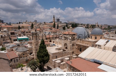Eye-bird panoramic view on Jerusalem Old City. Two gray domes of Church of the Holy Sepulchre on the foreground. Church of the Holy Sepulchre under reconstruction. Royalty-Free Stock Photo #2017262051