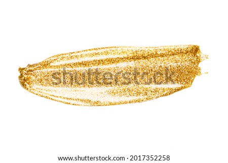 Makeup texture. Golden glitter smear of paint, nail polish, face mask on white background isolated. Cosmetic products. Royalty-Free Stock Photo #2017352258