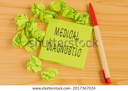 Text caption presenting Medical Diagnostic. Business concept detection of diseases or other medical conditions Multiple Assorted Collection Office Stationery Photo Placed Over Table