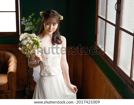 Bridal concept of a young asian woman. Wedding photo.