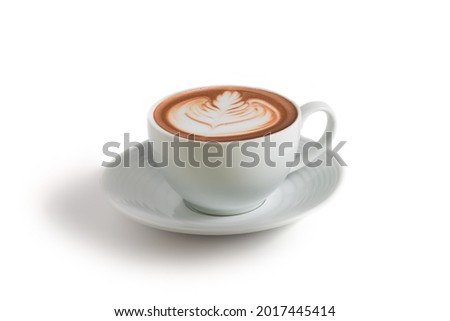 Front view of hot cafe Latte coffee with rosetta latte art in white ceramic cup isolated in white background. Arabica Espresso roasted coffee Royalty-Free Stock Photo #2017445414