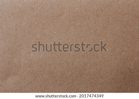 Sheet of brown paper page macro close up view. Blank card background