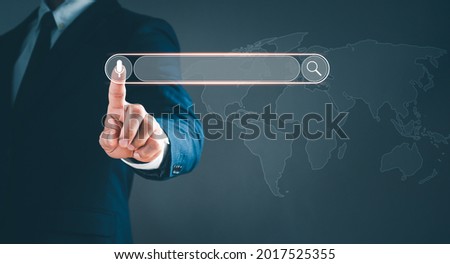 The man in a suit point to the sign of the voice and sound Search Engine Optimization SEO Networking Concept.Searching Browser of Internet Data Information with the blank search bar.