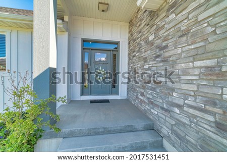 Exterior of an entrance of a house with contemporary design Royalty-Free Stock Photo #2017531451