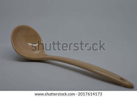 Picture Of Brown Plastic Ladle