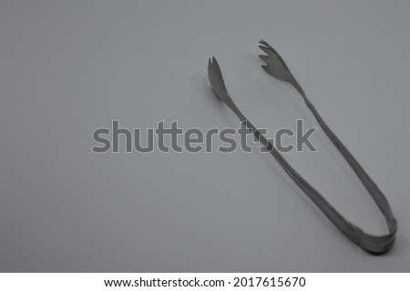 Picture Of Metal Food Tongs