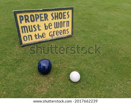 lawn bowling sign with bowl
