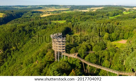 Treetop path Saarschleife excursion destination for the whole family, filmed with drone, from above.  Royalty-Free Stock Photo #2017704092