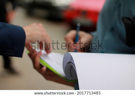 Signing the document, signing the petition
 Royalty-Free Stock Photo #2017713485