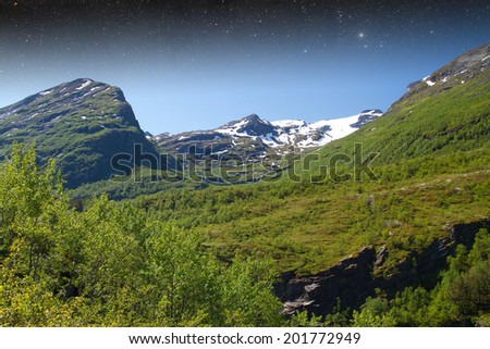 night in the mountains. Elements of this image furnished by NASA