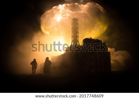 Creative artwork decoration. Chernobyl nuclear power plant at night. Layout of abandoned Chernobyl station after nuclear reactor explosion. Selective focus Royalty-Free Stock Photo #2017748609