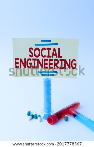Text caption presenting Social Engineering. Word for attack photo that relies heavily on human interaction Writing Important Medical Notes Laboratory Testing Of New Infections