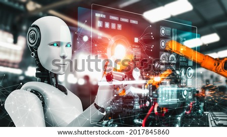 Mechanized industry robot and robotic arms for assembly in factory production . Concept of artificial intelligence for industrial revolution and automation manufacturing process . Royalty-Free Stock Photo #2017845860