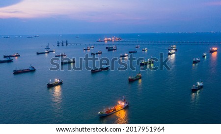 Aerial view tanker offshore in open sea at night, Refinery industry cargo ship, Oil product tanker and LPG tanker at sea view from above, Aerial view oil tanker ship vessel. Royalty-Free Stock Photo #2017951964