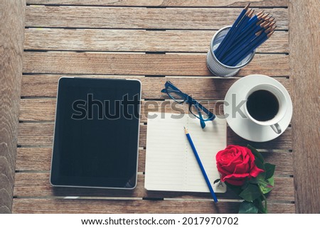 Top view office desk laptop and coffee cup on wood table copy space. Tabletop notebook laptop coffee cup for officer display empty space on wooden background. Home business work from home workspace