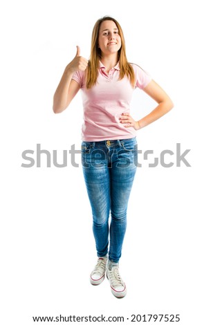 Girl with thumb up over white background