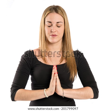 Girl in zen position over white background 