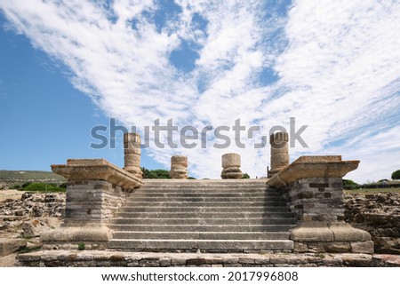 Ruins of Baelo Claudia. Staircase with remains of columns in a Roman archaeological site on the beach of Bolonia, Spain. Royalty-Free Stock Photo #2017996808