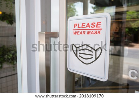 Wear masks, Keep your distance and sign on shop front door when new normal during coronavirus outbreak in the shop for business.