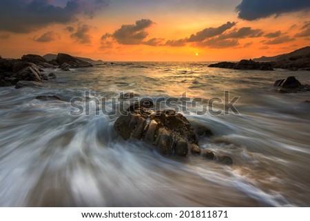 Sea landscape with waves on the beach against sunset,Phuket