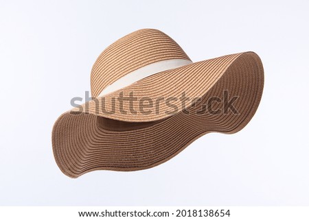 Vintage Panama hat, Womens summer yellow straw hat with the white ribbon isolated on white background. Royalty-Free Stock Photo #2018138654