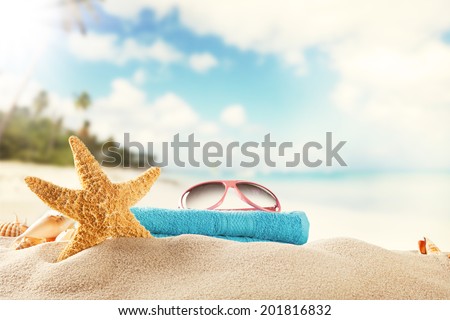Sandy summer beach with blur sea on background