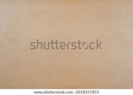 Fiberboard (MDF) surface. Recycled wood texture. Wooden surface of a fibreboard d sheet, top view. Brown hardboard texture background. 