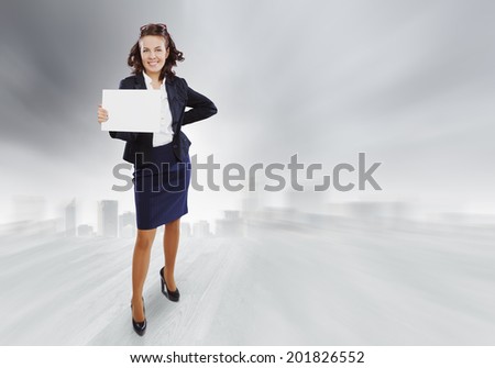 Top view of smiling businesswoman holding white blank banner. Place for text