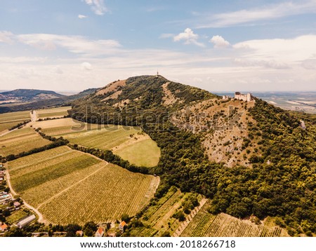 Devicky castle on Pavlov hills in Palava nature reserve. Famous landmark on South Moravia. Czech Republic, Central Europe. vineyards