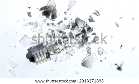 
Broken Light Bulb on white background. The broken glass from the bulb was broken. 	 Royalty-Free Stock Photo #2018271893