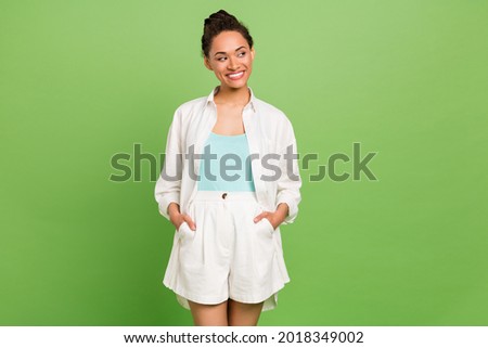 Photo portrait woman looking blank space dreamy curious isolated pastel green color background