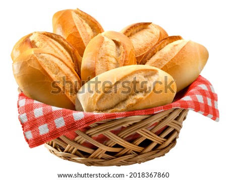 buns in wicker basket under red and white checkered tablecloth Royalty-Free Stock Photo #2018367860