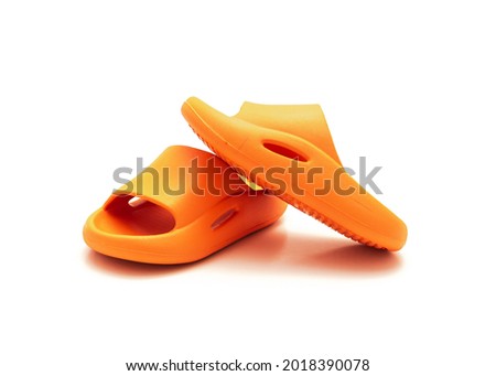 A pair of pillow slide sandals for toddler isolated on white background. Foam slippers for boys and girls Royalty-Free Stock Photo #2018390078