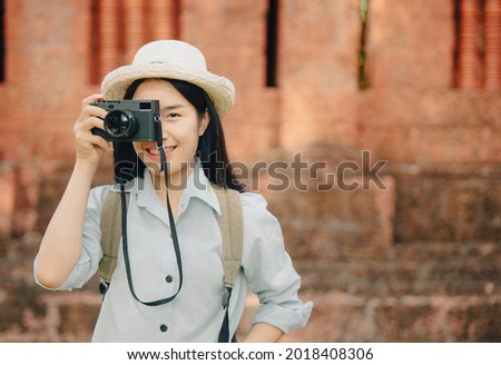 Asian women be smile with camera Travel Holiday Relaxation Concept