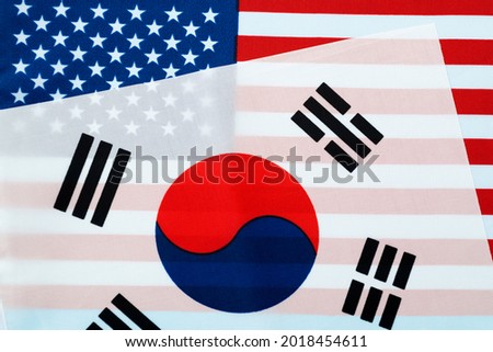 American and South Korean national flags together. Royalty-Free Stock Photo #2018454611