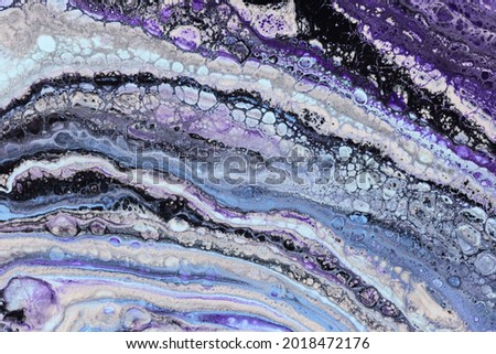 Photo of floating paints texture. Abstract ink background