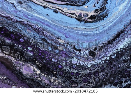 Abstract texture of floating paint. Mosaic pattern. Background with abstract swirling paint effect
