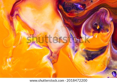 Creative abstract trendy texture of floating paint. Photo of flowing inks background
