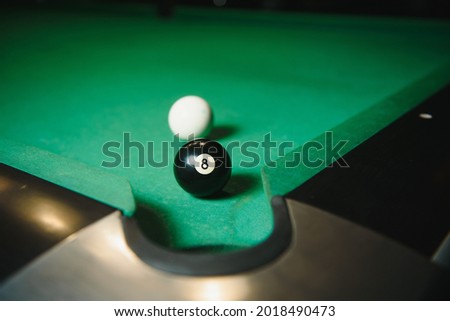 black ball shot in snooker game.