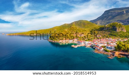 View from flying drone of Paralia village. Colorful outdoor scene of Peloponnese peninsula, Greece, Europe. Picturesque seascape of Myrtoan Sea. Traveling concept background.
