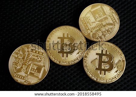 Bitcoin Cryptocurrency Coins or digital money with black background