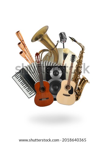 Group of different musical instruments on white background Royalty-Free Stock Photo #2018640365