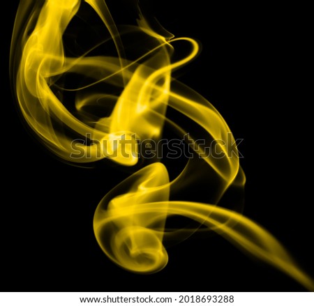 swirling movement of gold smoke group, abstract line Isolated on black background
