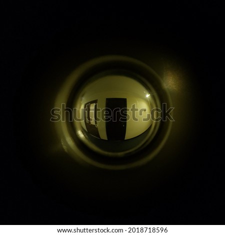 i look through the peephole at night in the hotel Royalty-Free Stock Photo #2018718596