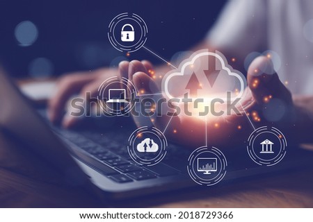 man use Laptop with cloud computing diagram show on hand. Cloud technology. Data storage. Networking and internet service concept. Royalty-Free Stock Photo #2018729366