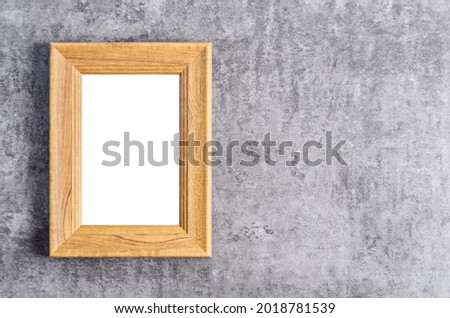 Empty wooden frame on dark background, Save clipping path.