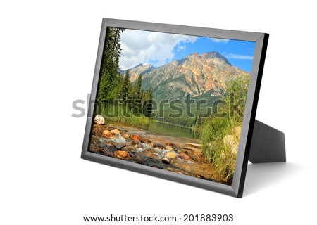 Picture frame with Pyramid mountain lake landscape photo  (Jasper National Park,Alberta, Canada). Isolated on  white background. Collage of my photos
