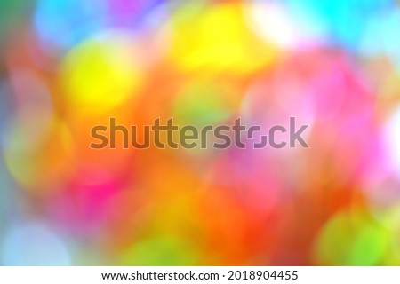 Abstract bokeh background. Multicolored balls on surface texture