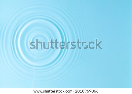 Water background. Blue water texture, surface of blue swimming pool. Spa concept background. Flat lay, top view, copy space Royalty-Free Stock Photo #2018969066