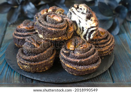 Puff buns with poppy seeds and sugar  